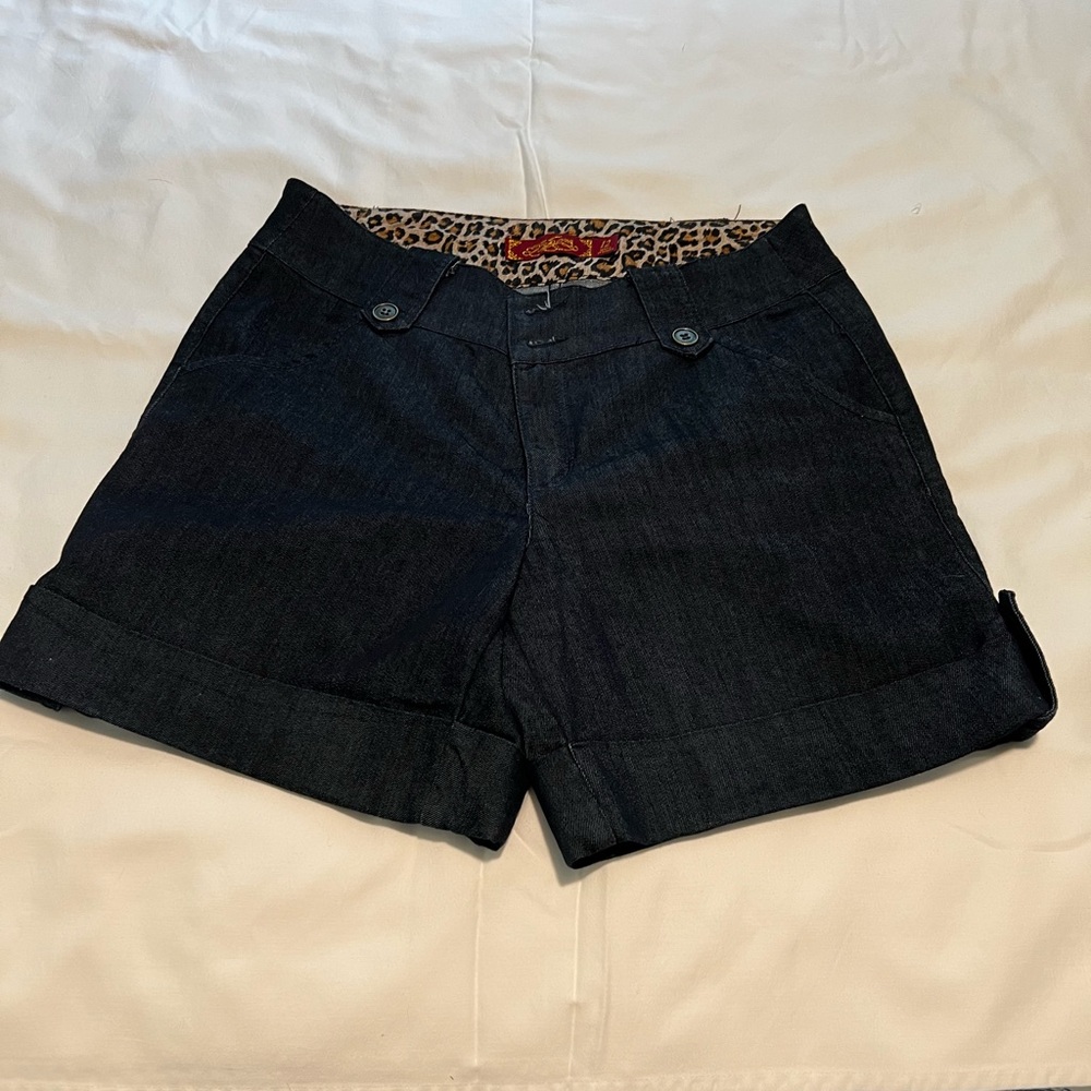 Dark blue denim shorts. Excellent used condition. Size 12.